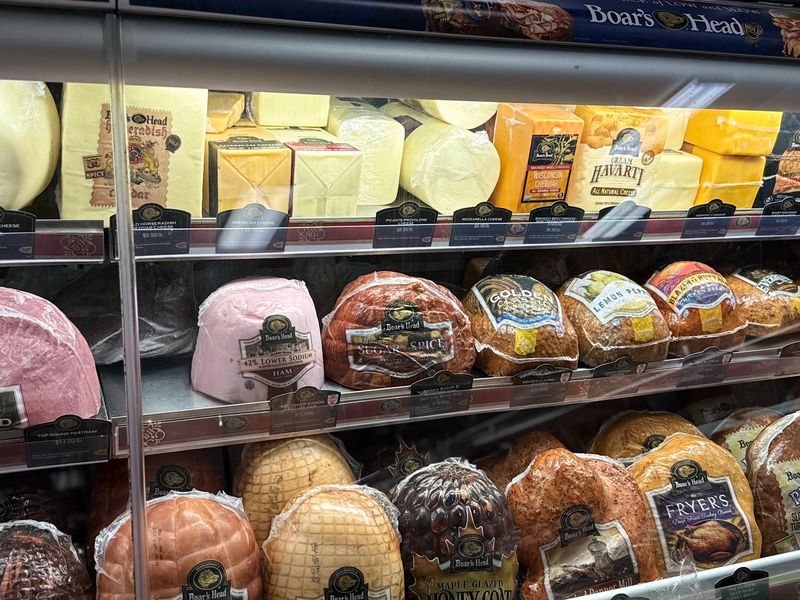 The Deli Case And Sandwiches Made All Day