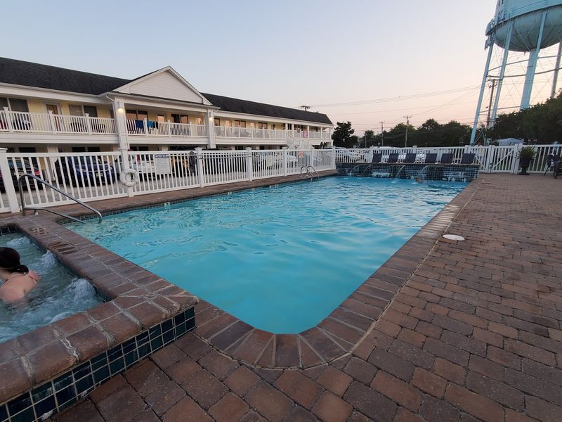 The Outdoor Pool and Hot Tub Setup on a Warm Afternoon