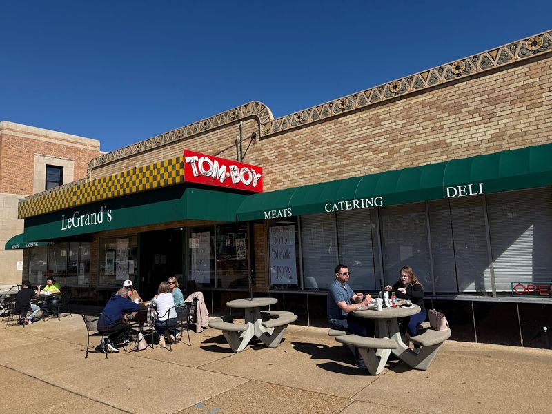 The Tom-Boy Sign and a Corner Store That Refused to Fade The Tom-Boy Sign and a Corner Store That Refused to Fade