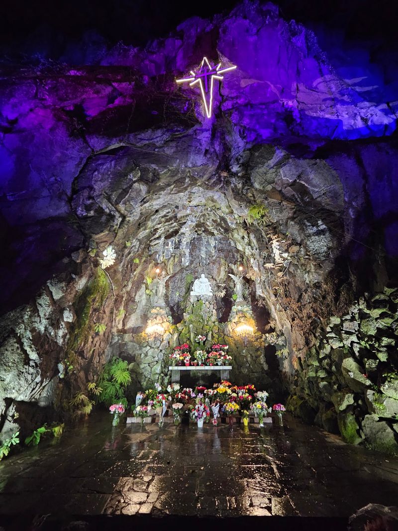 The cave carved right into the basalt wall