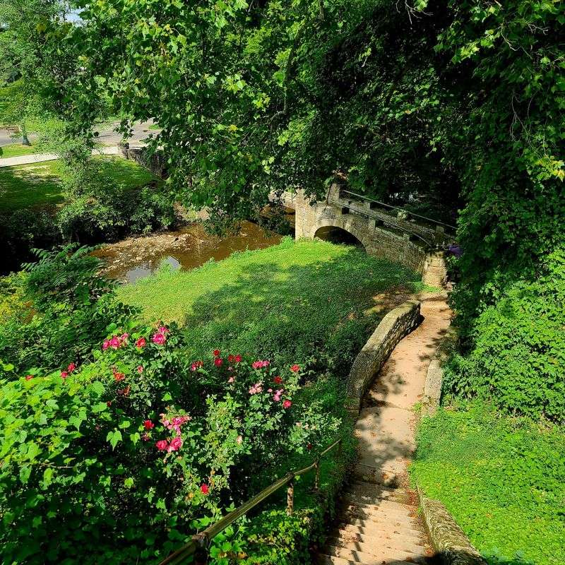 Winding Paths, A Creek, And Old Bridges