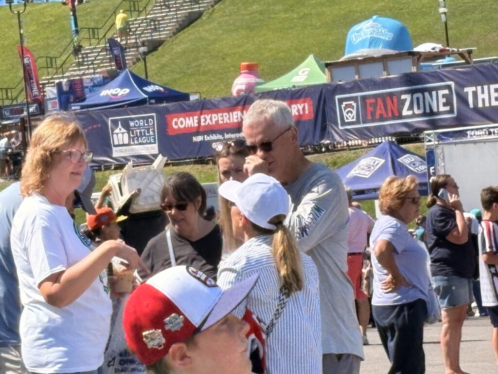 Baseball fans of all ages enjoy the Fan Zone and concessions at the Little League World Series baseball complex.