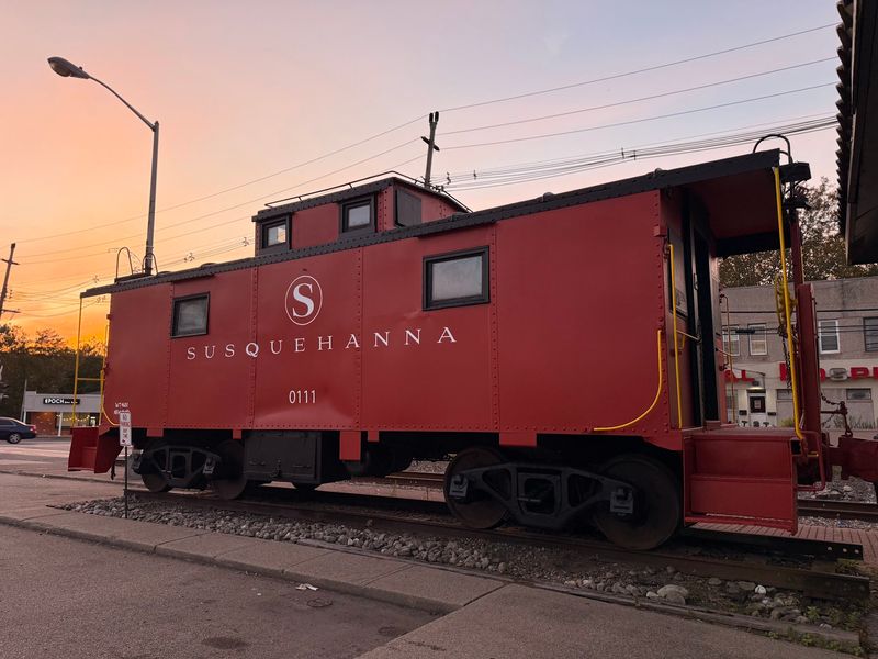 A Caboose Parked Right Next Door