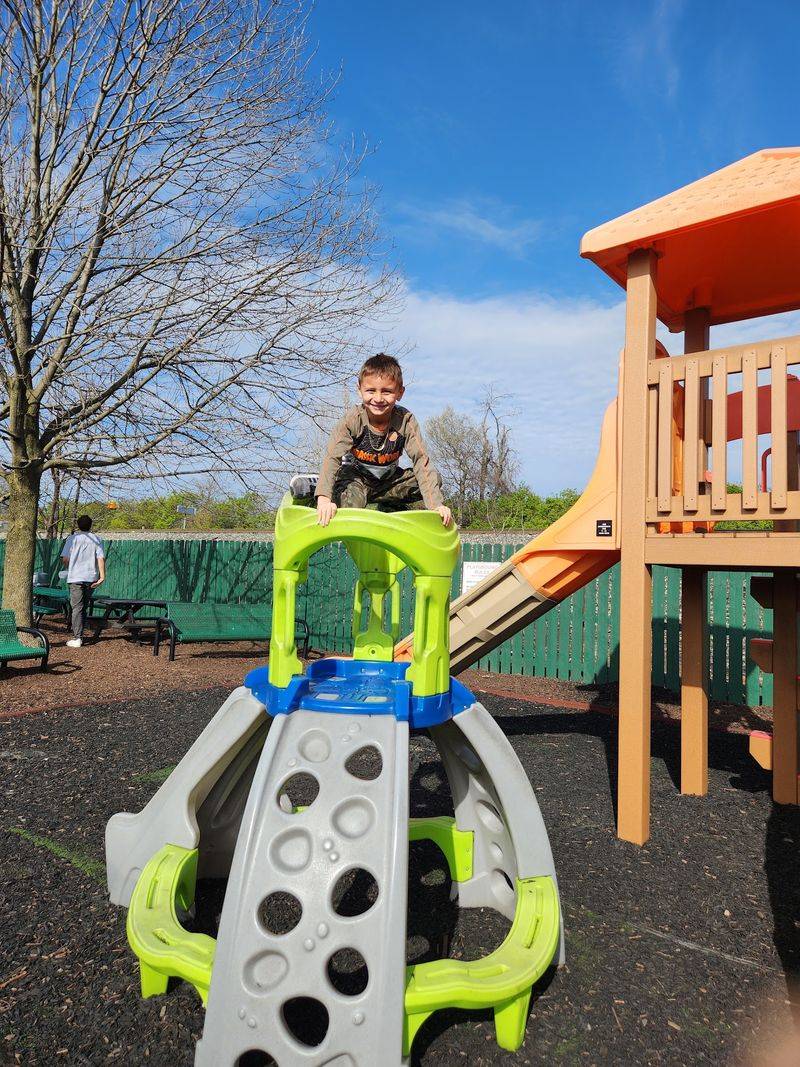 A Playground And Passing Trains For The Kids