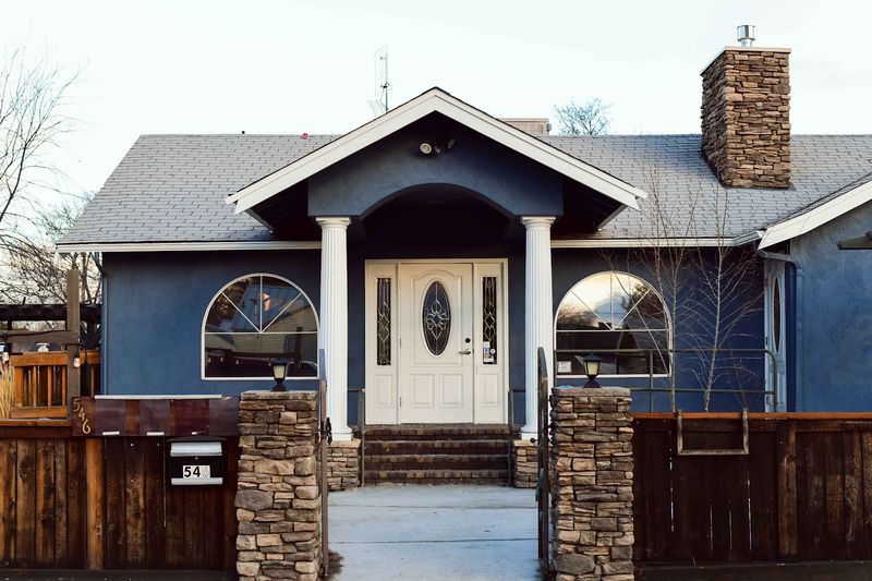A Small House With A Big Kitchen Behind It A Small House With A Big Kitchen Behind It