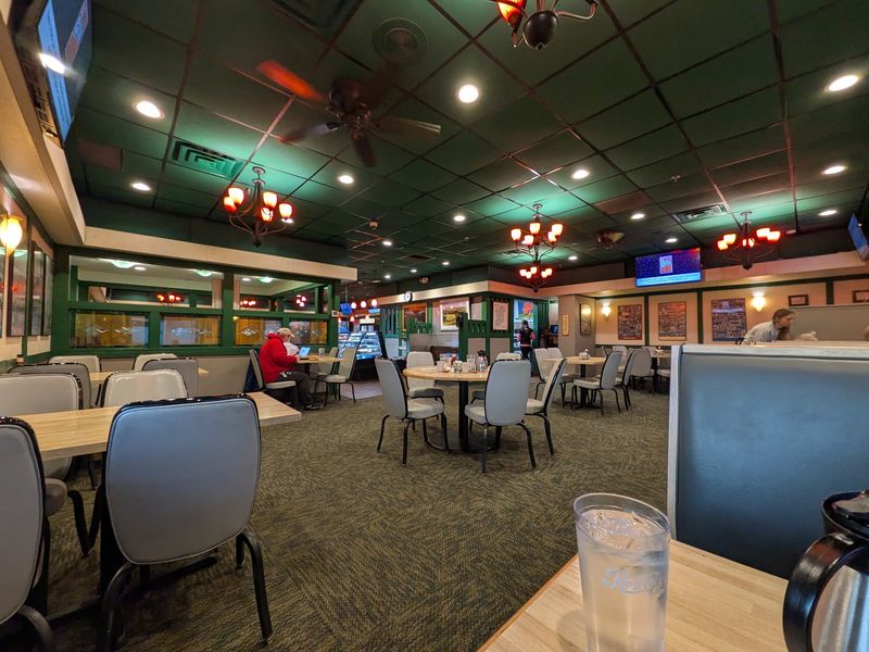 Booths, Coffee Cups, and a Room That Feels Familiar