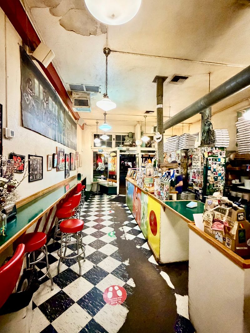 Checkered Floors And Red Stools Doing All The Work