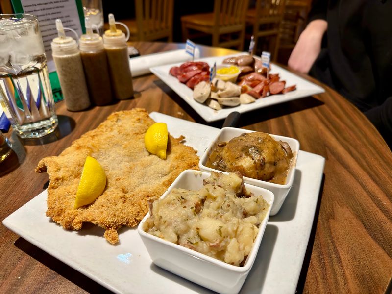 Crispy Schnitzel That Hangs Over the Plate Crispy Schnitzel That Hangs Over the Plate