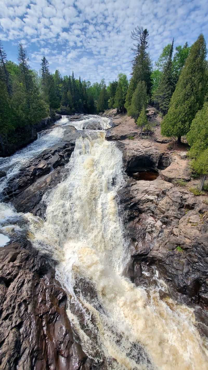 Cross River Falls Tumbles Right Beside The Highway
