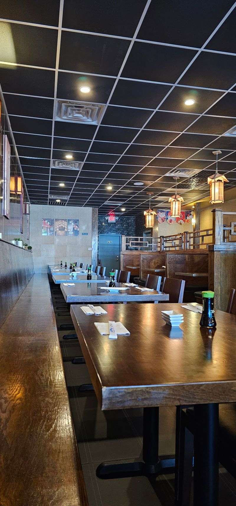 Dark Wood Tables And A Room That Lets You Linger