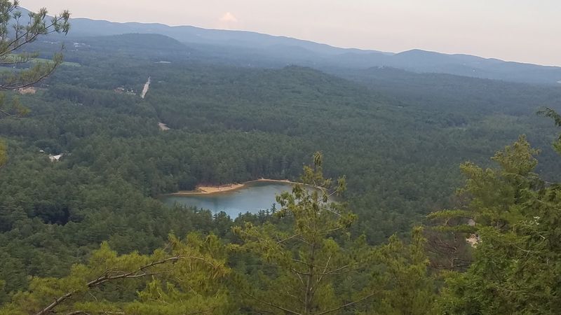 Echo Lake Sparkles at the Foot of the Cliff