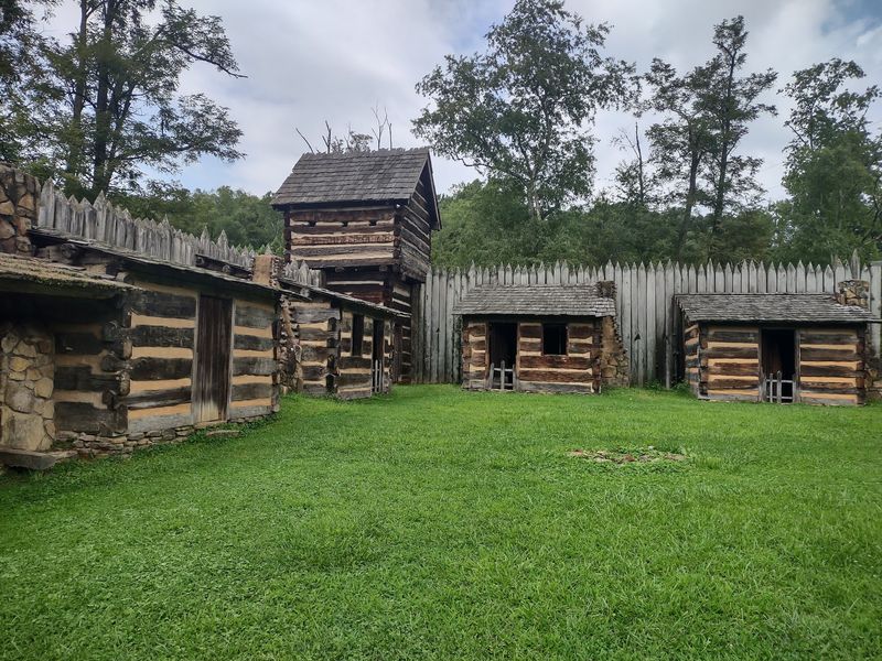 Eighty Families Behind the Log Walls Eighty Families Behind the Log Walls