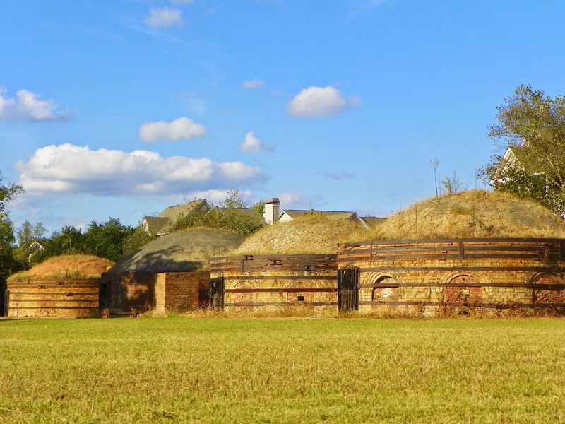 Four Beehive Kilns Sitting in a Quiet Row Four Beehive Kilns Sitting in a Quiet Row