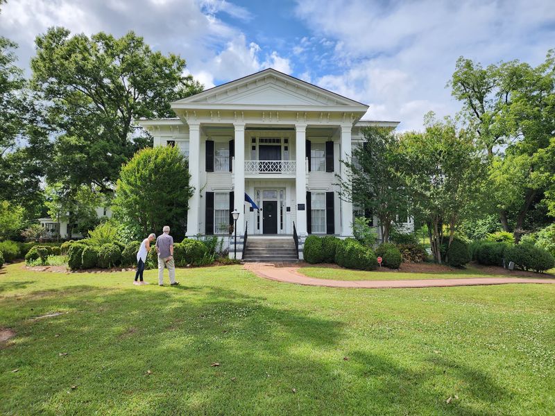 Four Square Columns and a Front That Stops You