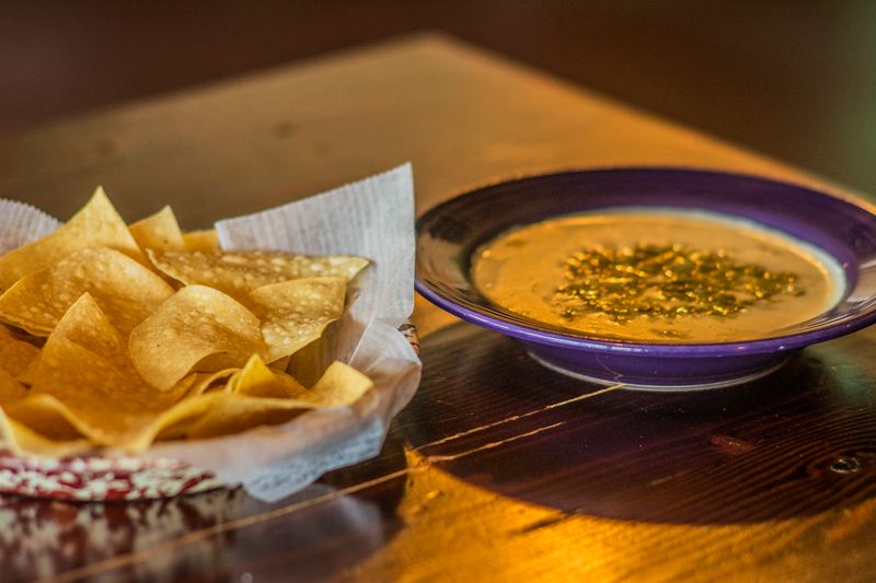 Green Chili Queso, Chips, and That First Basket Green Chili Queso, Chips, and That First Basket