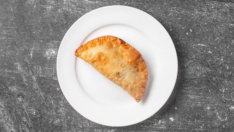 Handheld Treats Like Empanadas, Stuffed Plantains, and Quesitos Handheld Treats Like Empanadas, Stuffed Plantains, and Quesitos