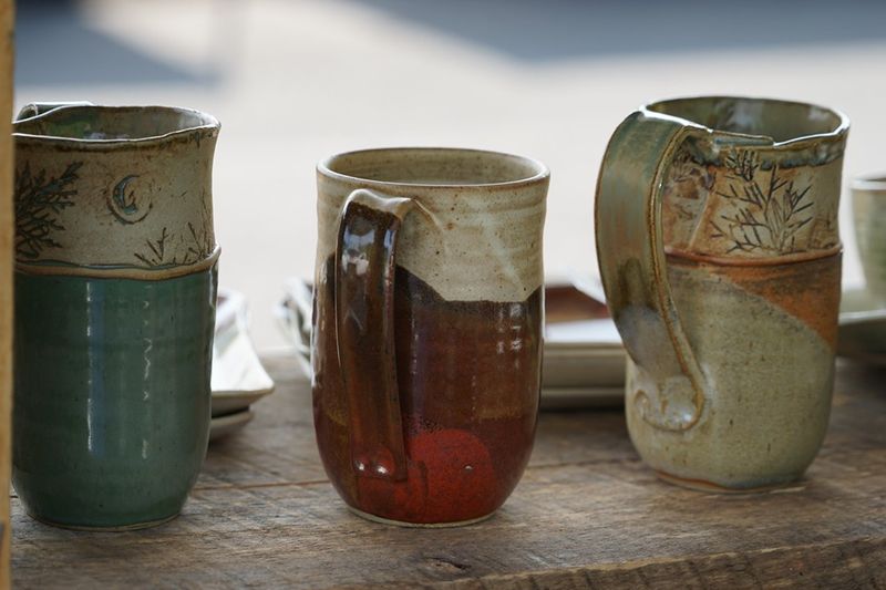 Handmade Goods, Pottery, And Flowers For The Table