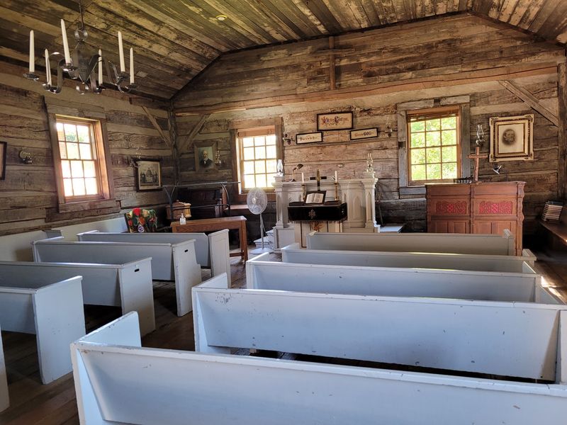 Log Houses and a Working Church Built From Hewn Timber