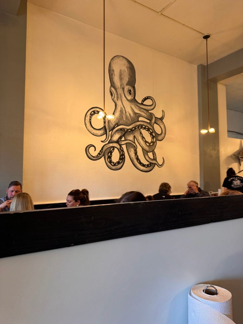 Nautical Charm With Octopus Art and Ship Wheels