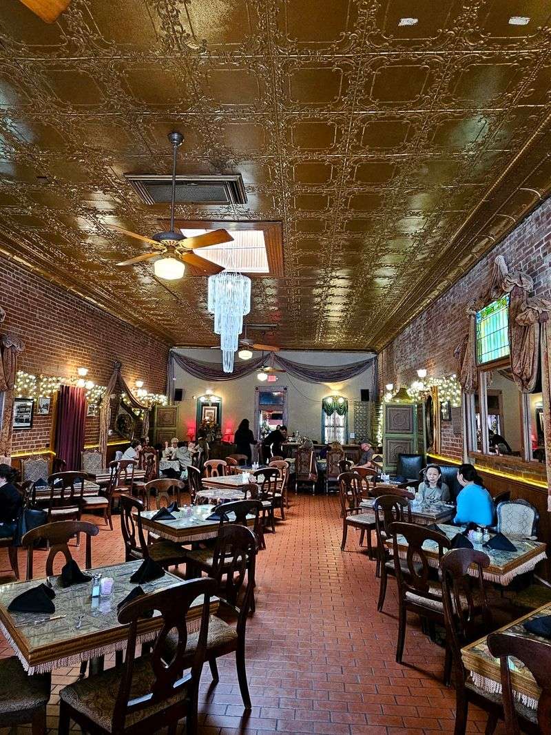 Original Tin Ceilings Overhead In The Main Dining Room