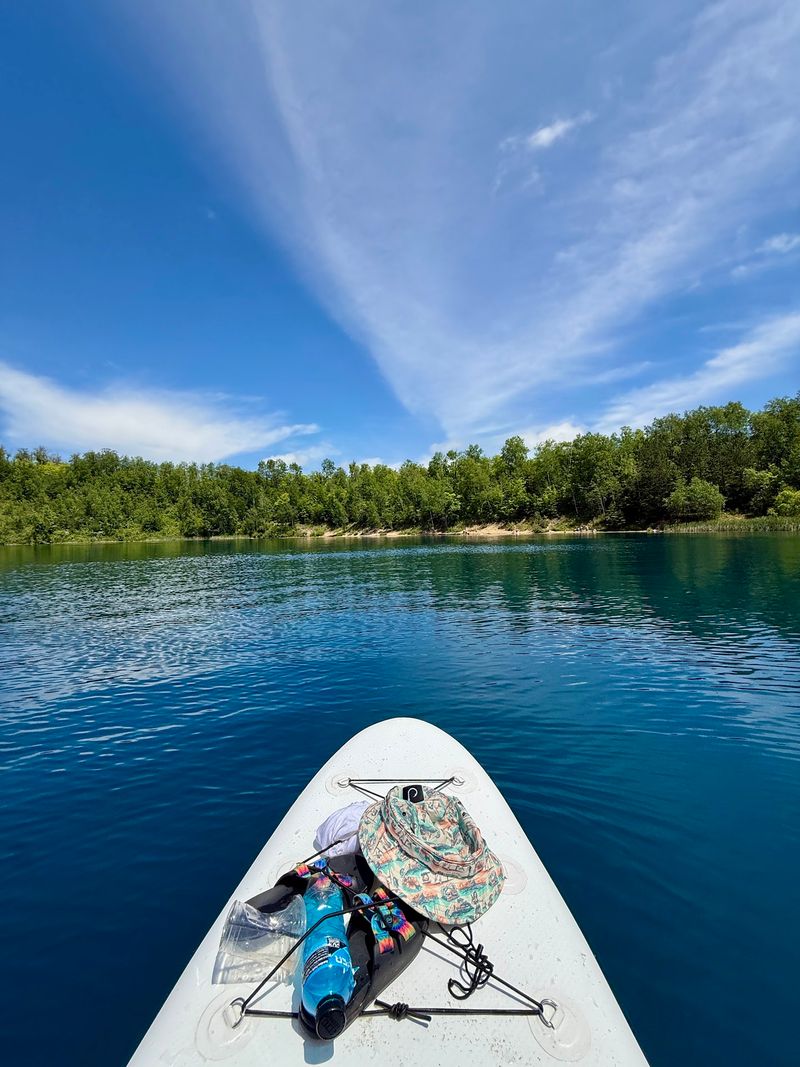 Paddleboarding Across Glass Paddleboarding Across Glass