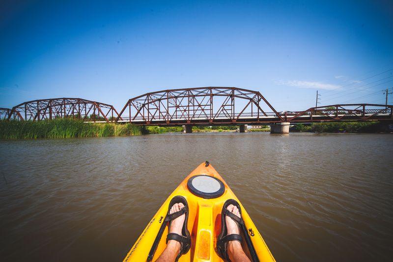 Paddling the Water Beneath the Span Paddling the Water Beneath the Span