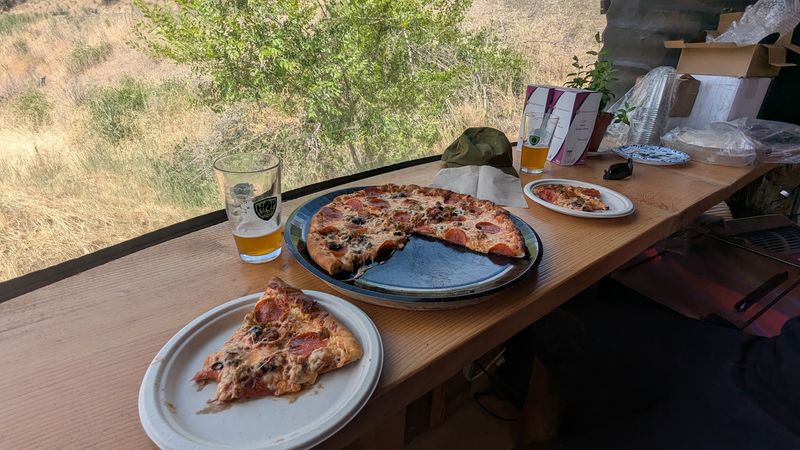 Pizza Up Top, Seats Down Below Pizza Up Top, Seats Down Below