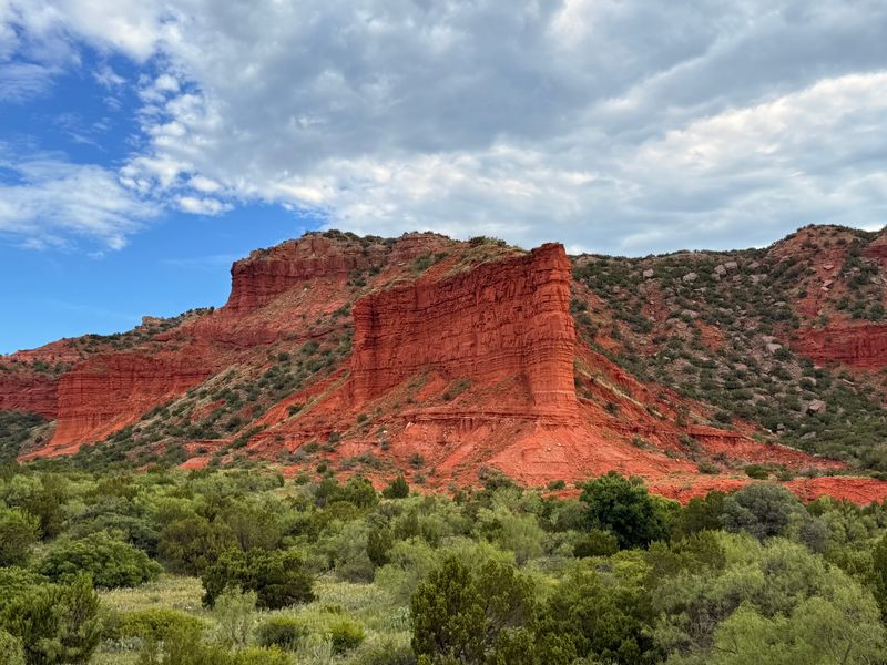 Red Rock Walls That Hide Under a Flat Horizon Red Rock Walls That Hide Under a Flat Horizon