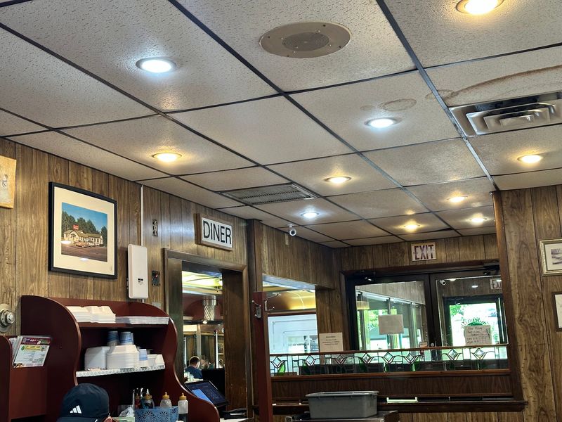 Red Vinyl Booths and Wood-Paneled Charm