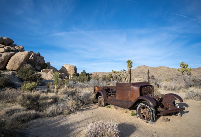 Rusted 1930s Cars Parked Forever in the Wash Rusted 1930s Cars Parked Forever in the Wash