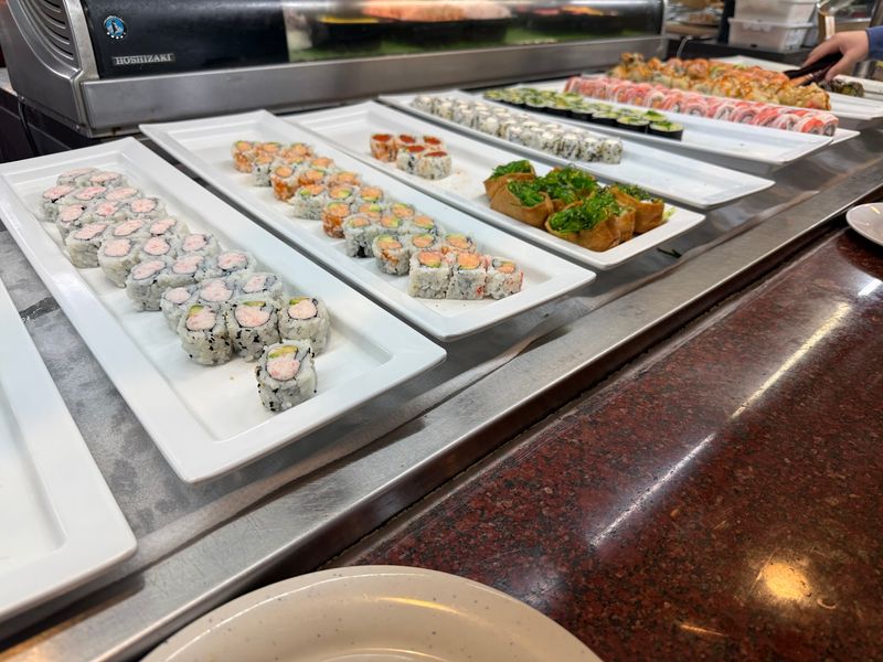 Sushi Rolls Lined Up Like A Rainbow Sushi Rolls Lined Up Like A Rainbow