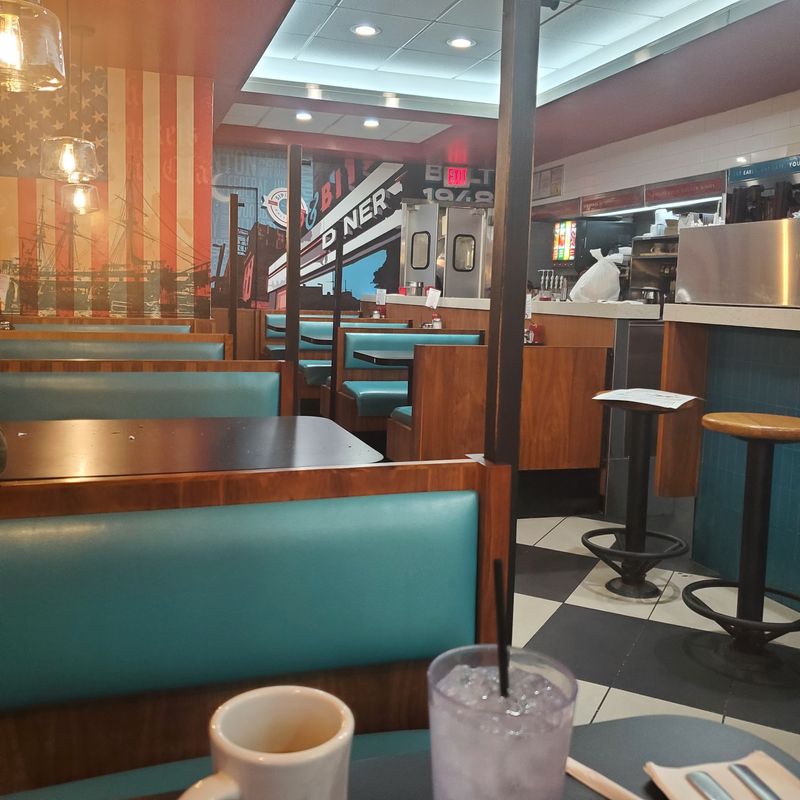 Ten Booths, One Griddle, and Plenty of Character Ten Booths, One Griddle, and Plenty of Character