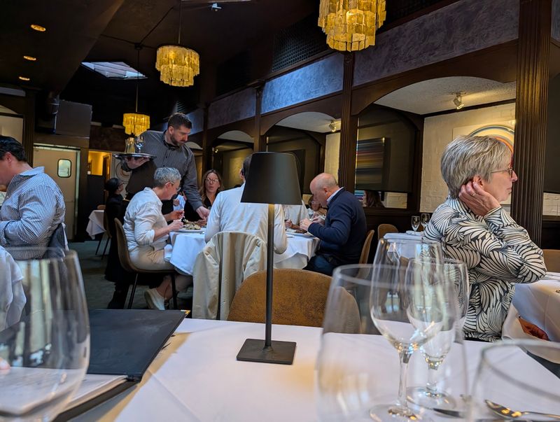 That Dark Wood And White Tablecloth Dining Room
