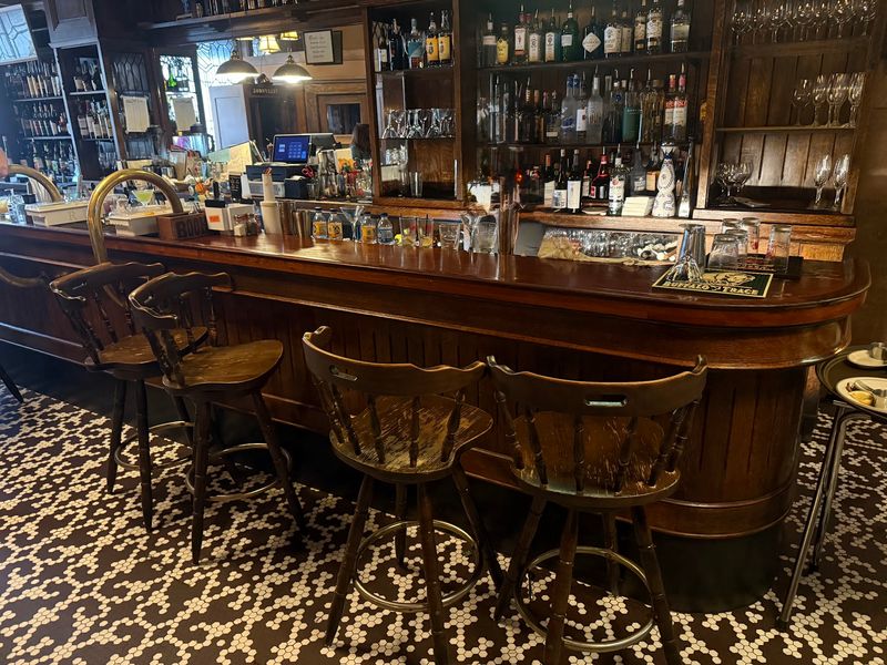 Tiger Oak, Marble, and a Tin Ceiling That Survived a Fire