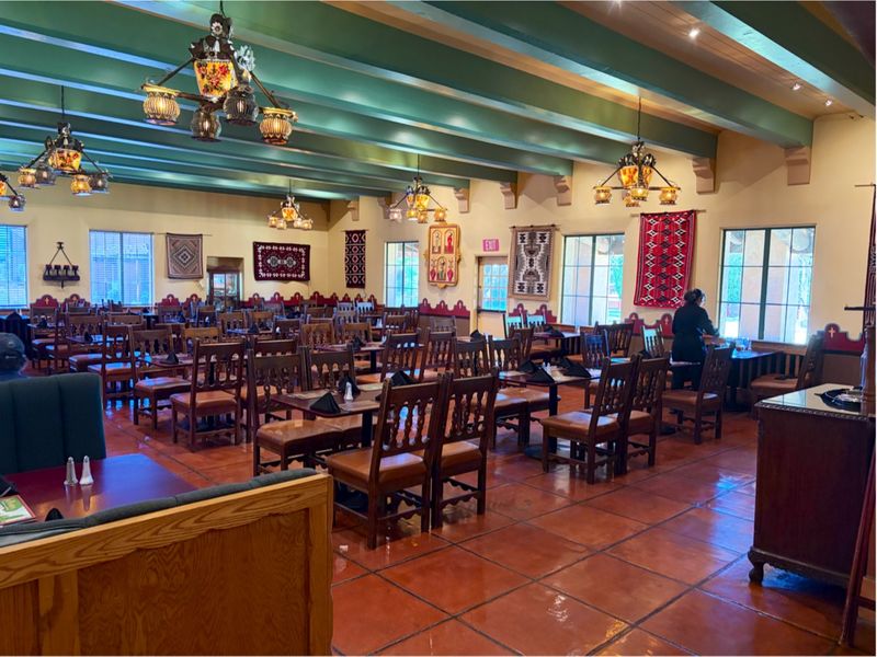 Turquoise Beams, Tin Chandeliers, and a Room That Sets the Mood