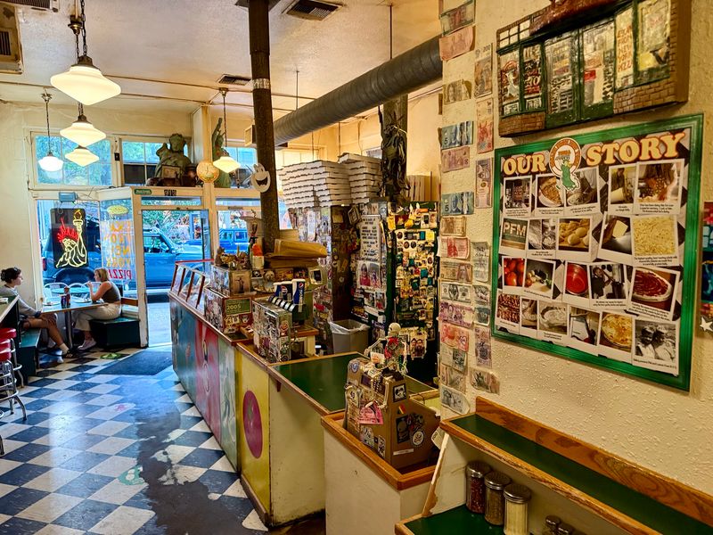 Walls Covered In Photos, Stickers And City Memories