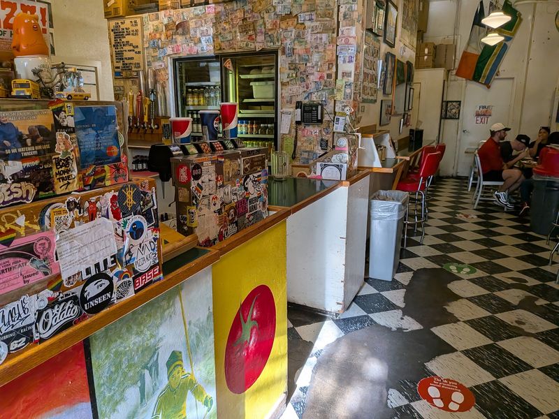 Walls Covered In Stickers, Photos, And Small Surprises
