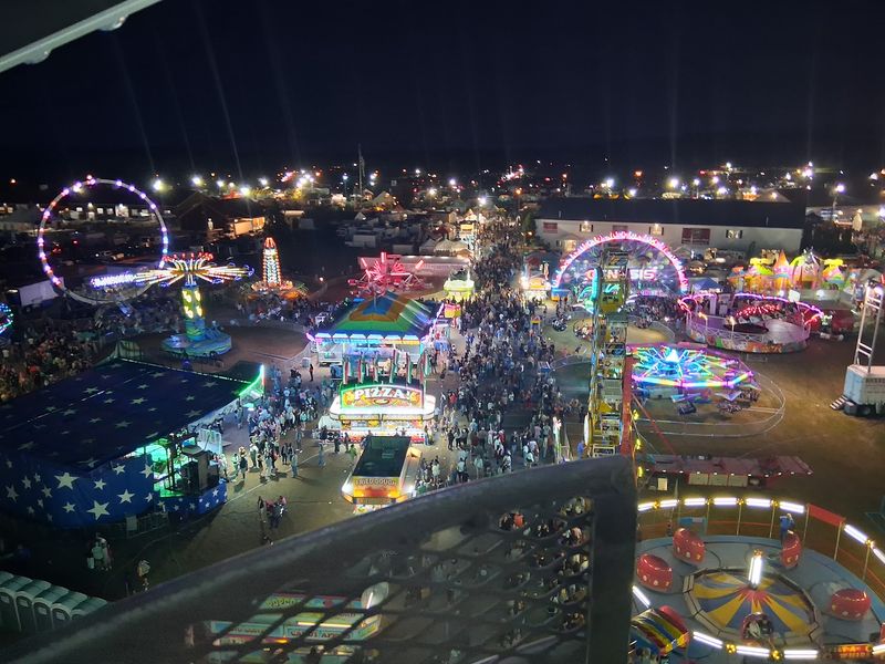 When the Sun Sets and the Midway Glows When the Sun Sets and the Midway Glows