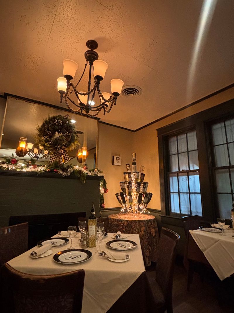 White Tablecloths and Candlelit Coziness