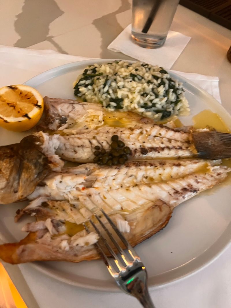 Whole Fish, Grilled Simply And Served With Lemon Whole Fish, Grilled Simply And Served With Lemon