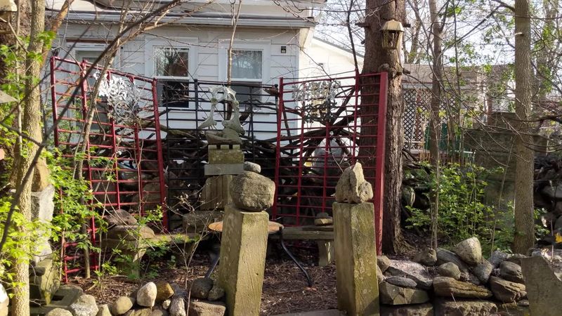 A Red Gate Behind an Ordinary House A Red Gate Behind an Ordinary House
