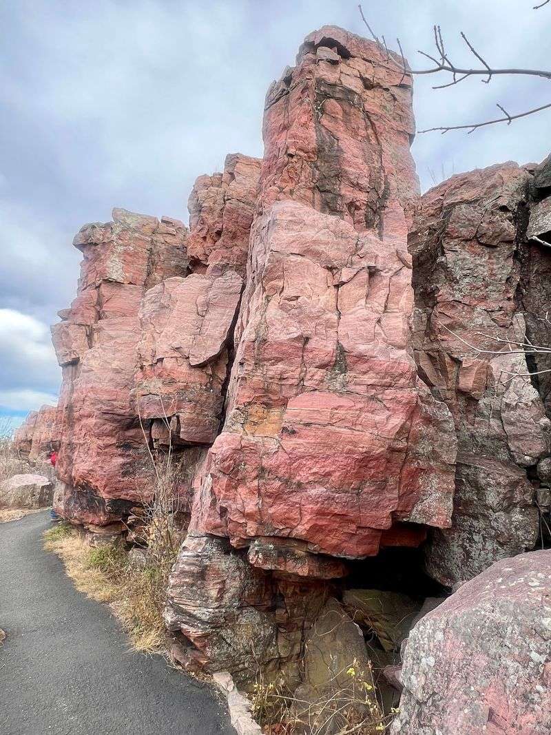 A Red Stone With Deep Roots