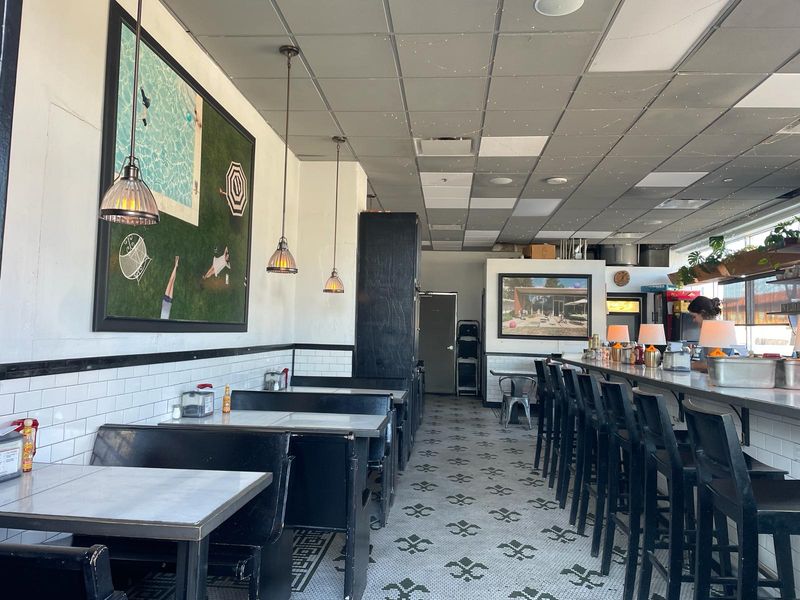 A Retro Diner Room With A VCR And Thriving Plants A Retro Diner Room With A VCR And Thriving Plants