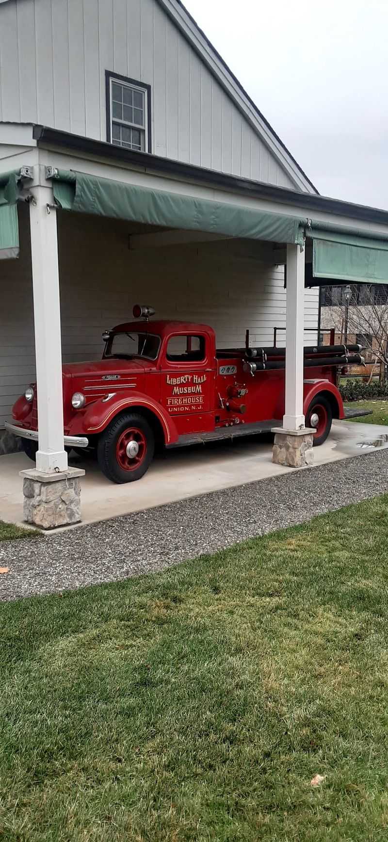 A Shiny 1911 Steam Engine Waits In The Firehouse