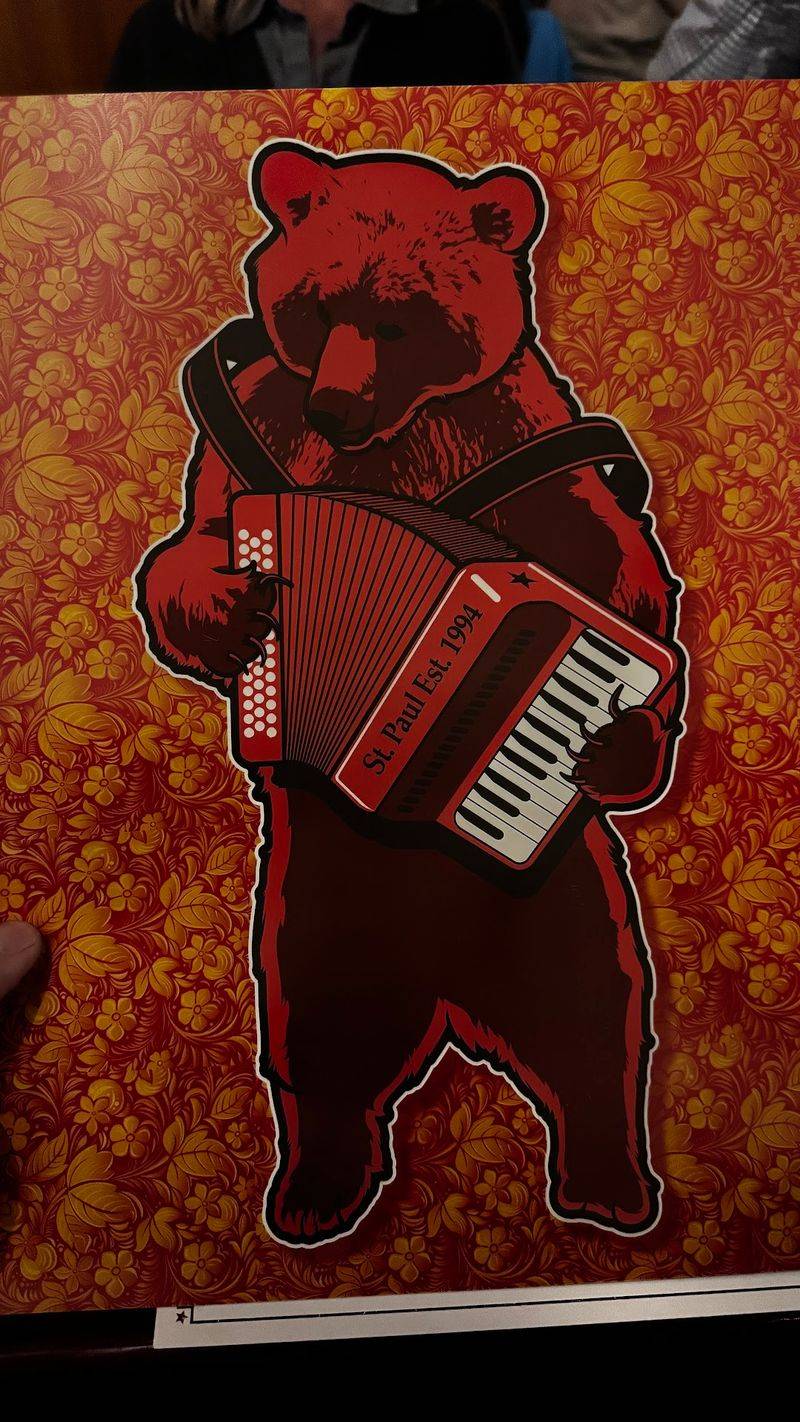 Accordion Music Drifting Between Tables