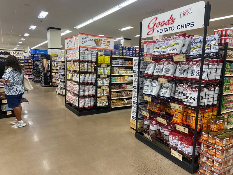 An Entire Aisle Of Snack Tubs Awaits Your Willpower