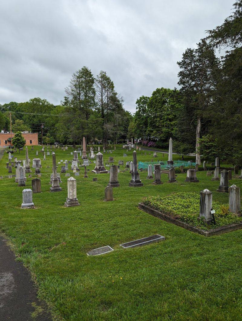An Old Cemetery Wrapped Around Two Sides