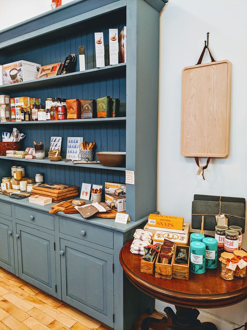 Antique Shelves And Warm Lighting Make Browsing A Treat