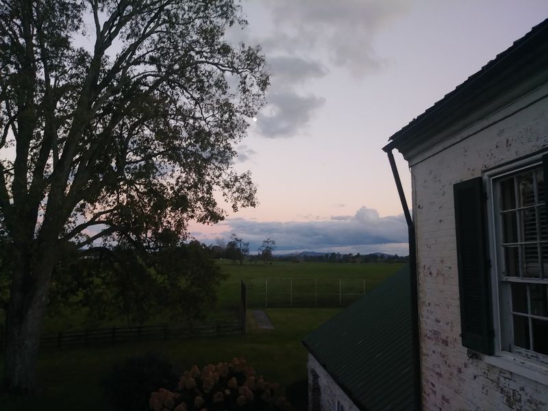 Barns, A Handsome House, And A Ridge That Refuses To Be Ignored