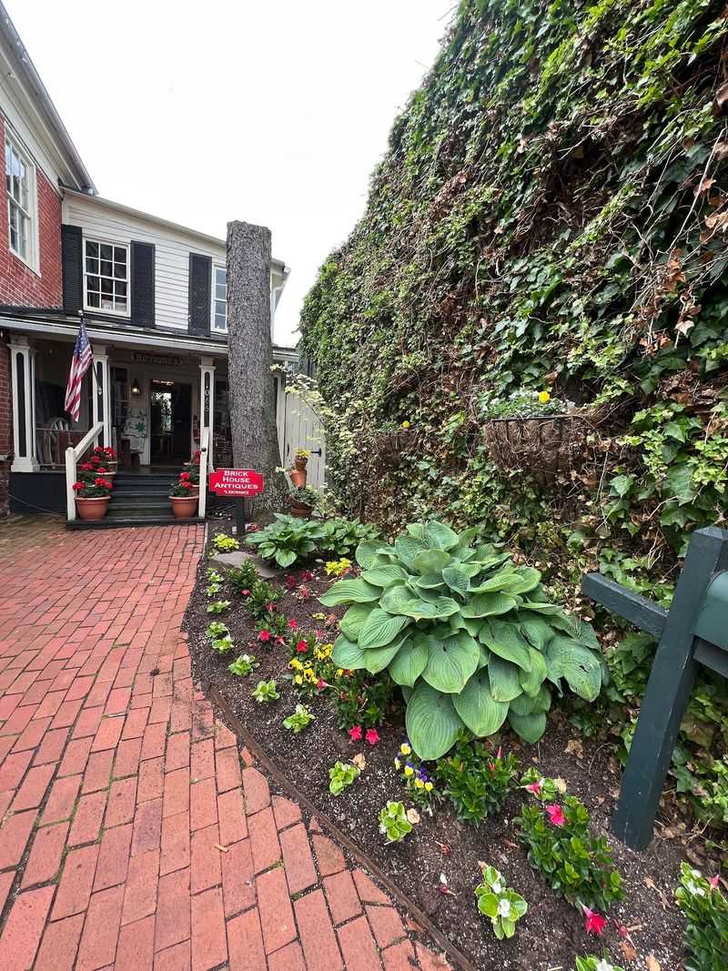 Brick Sidewalks and Green and Gold Plaques Brick Sidewalks and Green and Gold Plaques